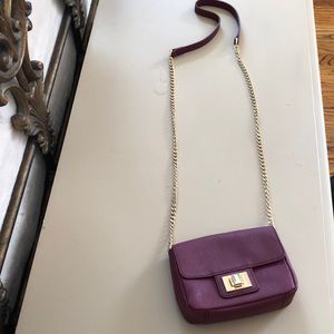 Baby bag  in burgundy color perfect for night out  used but no tag